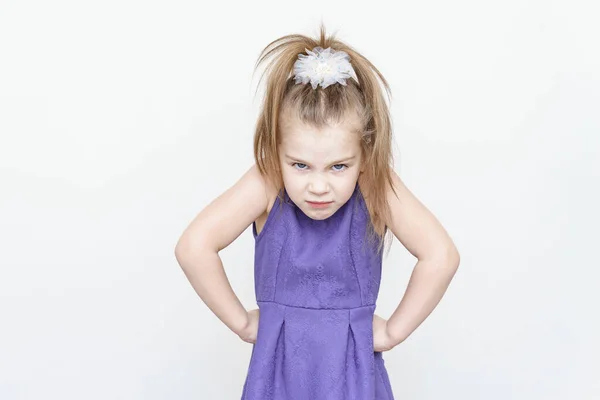 Cute Upset Little Girl Blue Dress Hands Sides — Stock Photo, Image