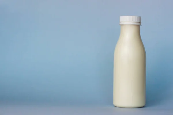 Bottle White Milk Highlighted Blue Background Close — Stock Photo, Image