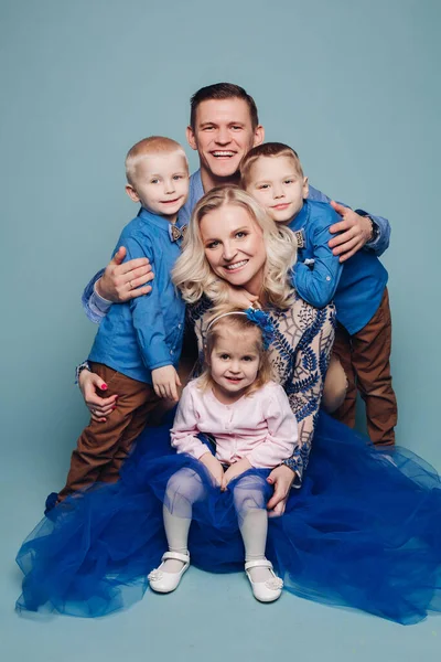 Loving Husband Wife Embracing Three Children — Stock Photo, Image