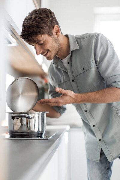 "confident young business man pointing at you"