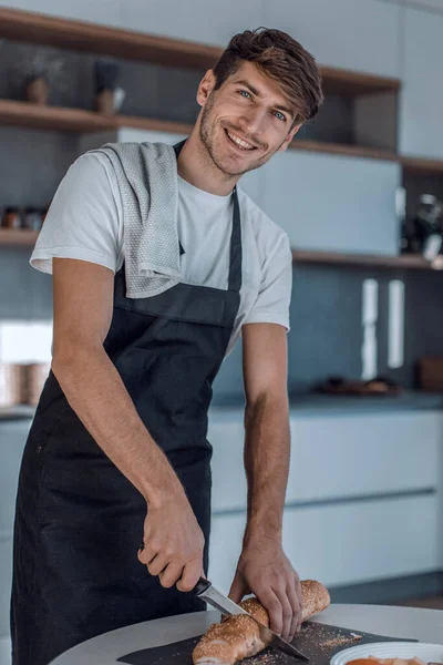 Smiling Man Apron Slicing Bread Sandwiches — Stock Photo, Image