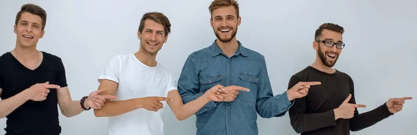Veselá Skupina Přátel Ukazující Jejich Prsty Stranu — Stock fotografie