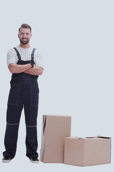 Serious Man Overalls Standing Boxes Isolated White — Stock Photo, Image