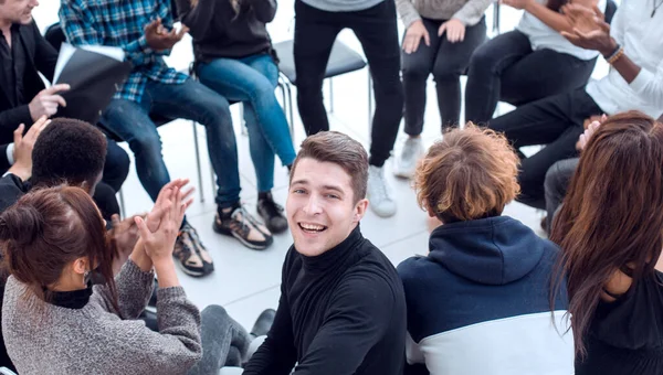 Smiling Young Man Sitting Circle Friends — Stock Photo, Image