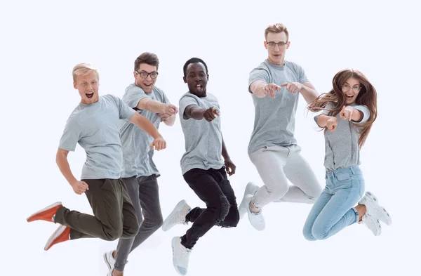 Случайная Группа Счастливых Молодых Людей Прыгает — стоковое фото