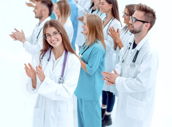 Πλαϊνή Άποψη Μια Ομάδα Γιατρών Χειροκροτούν Κοιτάζοντας Την Κάμερα — Φωτογραφία Αρχείου