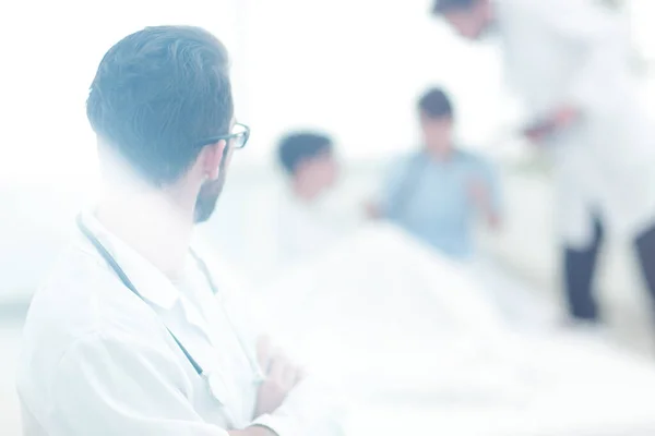 Blurred image of a patient in critical condition