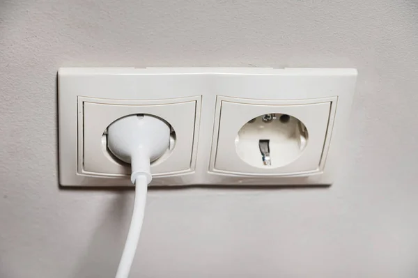 Two White Sockets Center One Free Device Connected Second — Stock Photo, Image