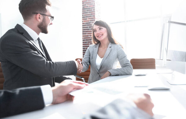 background image. рукопожатие бизнес-партнеров
