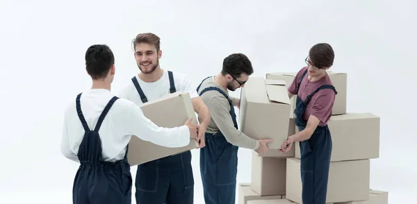 Movers Lifting Stack Cardboard Moving Boxes Isolated White — Stock Photo, Image