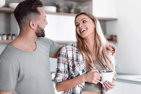 stock image happy young couple in kitchen in good morning time