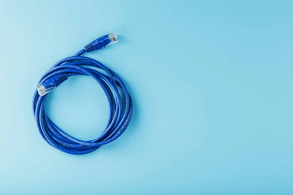 Blue Utp Internet Cable Isolated Blue Background Ethernet Cord — Stock Photo, Image