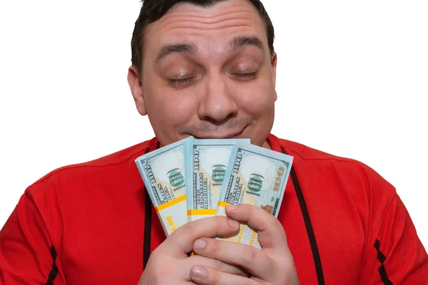 Szczęśliwy Człowiek Trzyma Pieniądze Rękach Wdycha Ich Zapach — Zdjęcie stockowe
