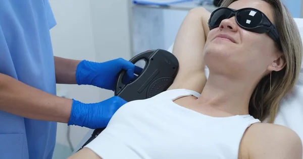 Woman Client Protective Glasses Having Laser Hair Removal Armpit Beauty — 스톡 사진