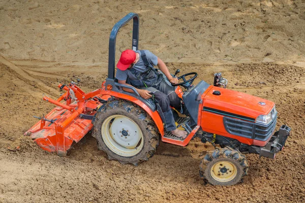 Farmer Mini Tractor Loosens Soil Lawn Land Cultivation Surface Leveling — Stok fotoğraf