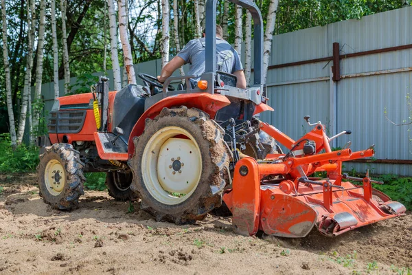 Farmer Mini Tractor Loosens Soil Lawn Land Cultivation Surface Leveling — Fotografia de Stock