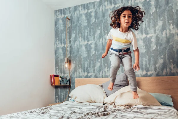Little Girl Legs Jumping High Her Parents Bed —  Fotos de Stock