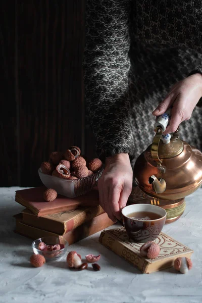Woman Pours Tea Copper Teapot Cup Still Life Lychee Cozy — Stok fotoğraf