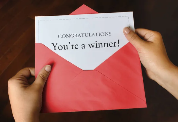 Open Red Envelope Letter Says Congratulations You Winner Female Hands — Stok fotoğraf