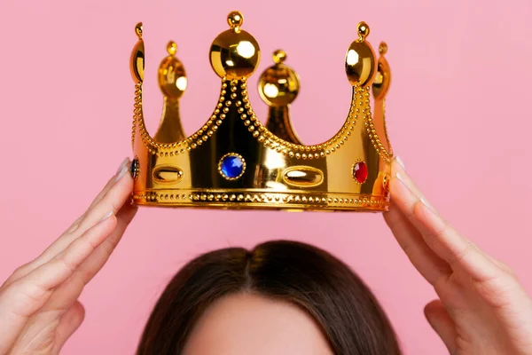Unknown Brunette Woman Putting Golden Crown Arrogance Privileged Status — Stockfoto
