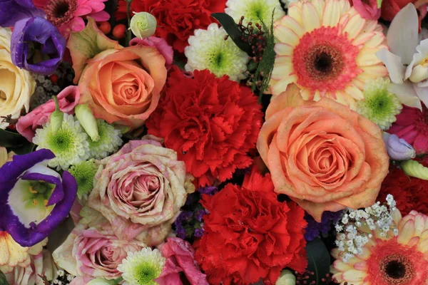 Mixed floral arrangement - flowers in different colors for wedding
