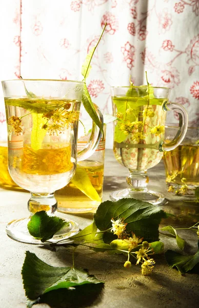 Two Glass Cups Freshly Made Yellow Linden Tea Leaves Flowers — Stok fotoğraf