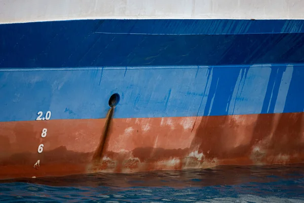 Close view of the side of a ship.
