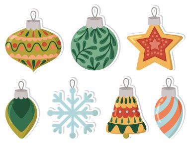 Renkli Noel süslemeleri olan el yazmaları. Şirin Yeni Yıl nesneleri