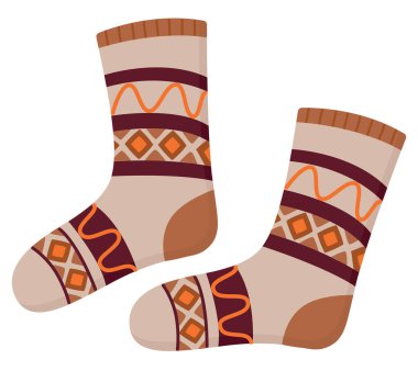 Dekoratif desenli bir çift örülmüş sıcak çorap. Güzel kışlık giysiler.