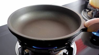 frying pan on gas stove