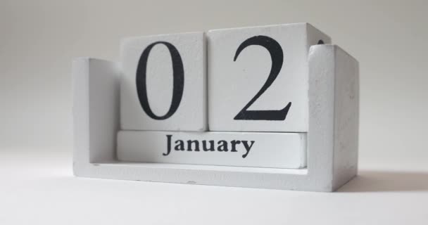 Feliz Año Nuevo Mano Masculina Gira Sobre Calendario Madera Cúbico — Vídeos de Stock