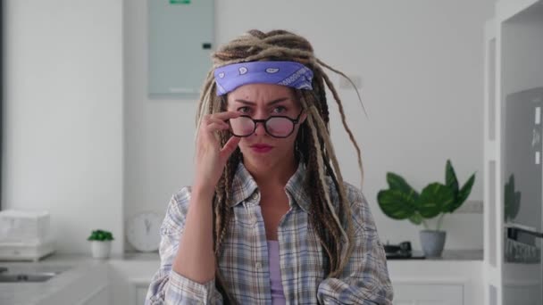 Thoughtful Millennial Hipster Woman Trendy Afro Dreadlocks Looking Lowered Eyeglasses — Stock Video