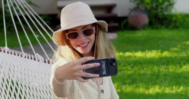 Pretty Happy Girl Blogger Lying Hammock Nature Does Selfie Video — Stock Video