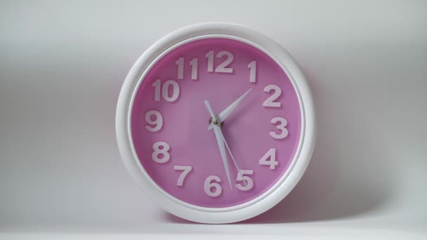 Portrait Clock Isolated White Background Pink Dial White Numerals Concept — Stockvideo