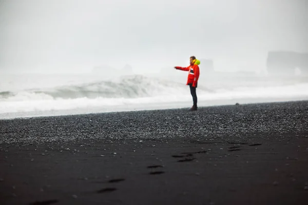 Man Waterproof Jacket Pants Standing Beach Black Volcanic Sand Reynisfjara Stock Photo