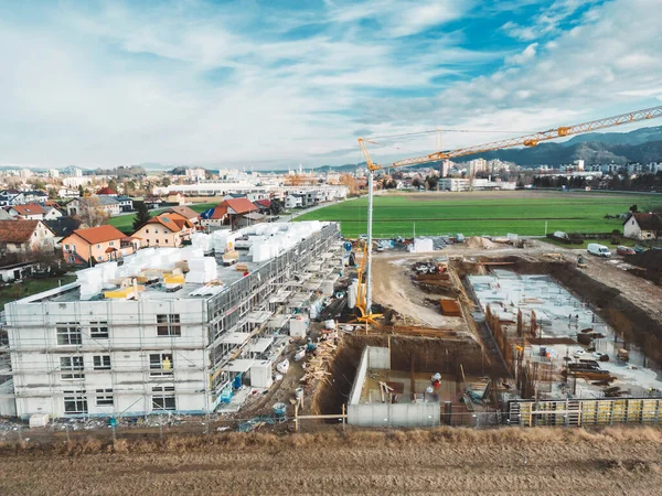Aerial view of construction site somewhere in the country side of Slovenia. Construction site of new residential building in the countryside.