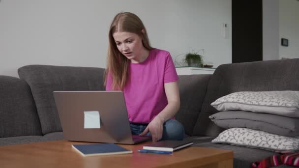 Excited Young Caucasian Woman Sitting Couch Laptop Her Lap Watching — Video