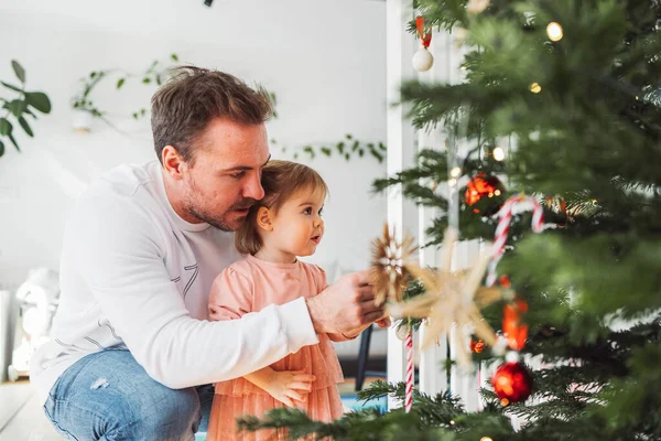 Portrait Young Caucasian Man His Daughter Decorating Christmas Tree Loving — Stock Fotó