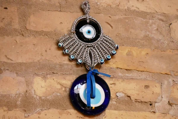 Protective talismans as a deflector against evil spirits and eyes. You always hang something like this on the wall in the entrance area of the house