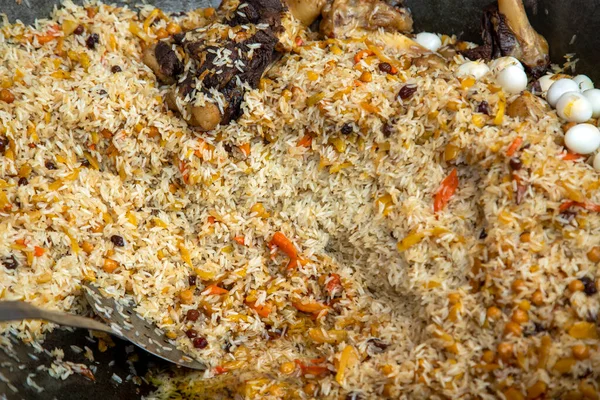 stock image One of the main ingredients of the plov dish is rice and carrots.