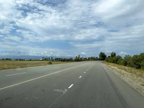 Stock image Drive by road at Lake Issykkul.