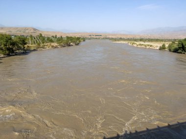 Naryn river from the bridge. clipart