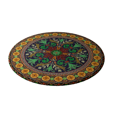 Yeşil yapraklı renkli bir halı. Halı yuvarlaktır ve mavi ve yeşil renktedir.