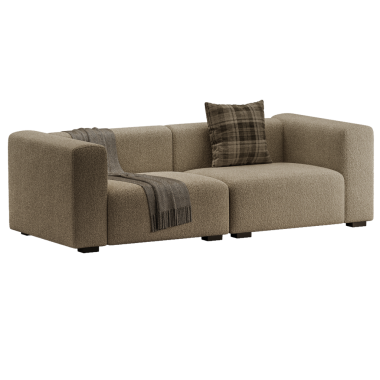 Üzerinde battaniye ve yastık olan bir kanepe. Kanepe kahverengi ve ekose desenli.