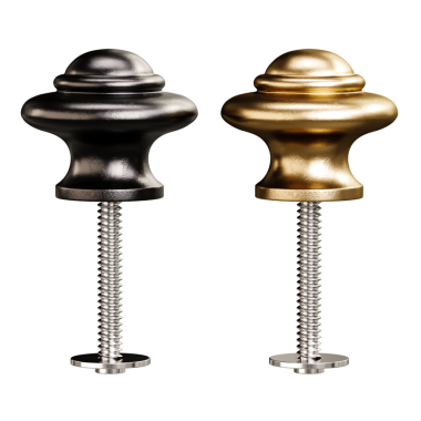 İki düğme, biri siyah ve biri altın, beyaz arka planda gösteriliyor. Siyah düğme altın olandan daha büyük.