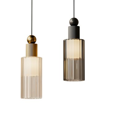 Tavandan sarkan iki lamba parçası. Biri altın, diğeri siyah. Altın eşyalar solda, siyah eşyalar da sağda.