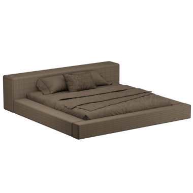 Kahverengi yorgan ve yastıklı bir yatak. Yatak beyaz arka planda.