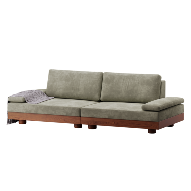 Üzerinde beyaz bir battaniye olan gri bir kanepe. Kanepe tahtadan yapılmış ve kahverengi bir rengi var.