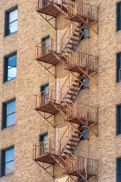 Fire Saftey Escape Ladders Orange Metal Red Brick Building Late — Stockfoto