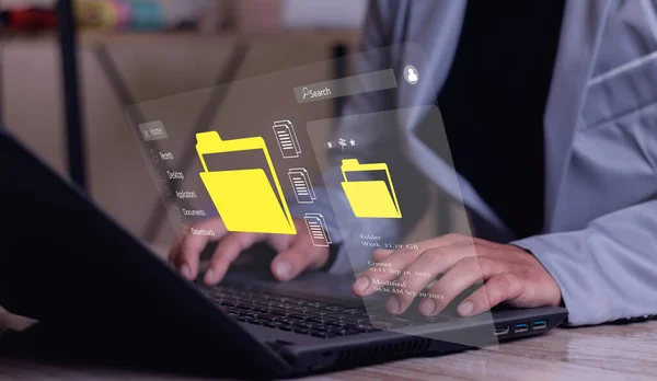 Document management system concept, business man holding folder and document icon software, searching and managing files online document database, for efficient archiving and company data